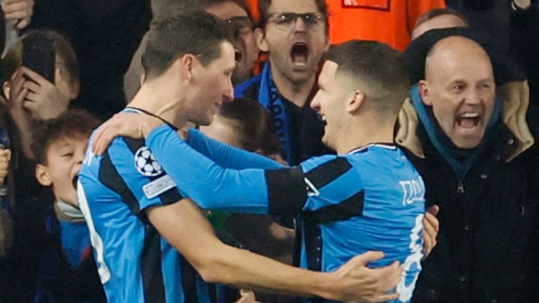 Brugge's Hans Vanaken, left, celebrates after scoring a penalty against Aston Villa