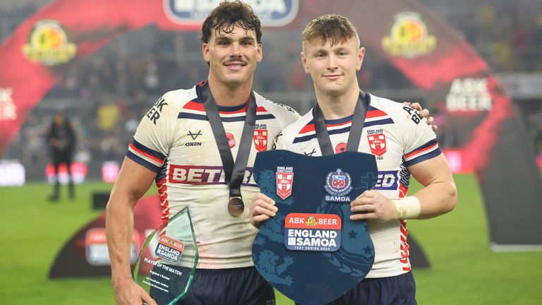 England's Player of the Match winner Herbie Farnworth and Harry Newman with the series trophy after winning the Autumn International Series test match between England and Samoa at Headingley Stadium on November 2, 2024 in Leeds, England.