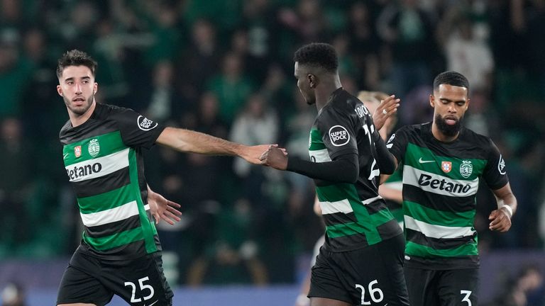 Sporting's Goncalo Inacio (25) celebrates after scoring his side's first goal against Arsenal during the Champions League opening phase soccer match at the Alvalade stadium in Lisbon, Tuesday, Nov. 26, 2024. (AP Photo/Armando Franca)