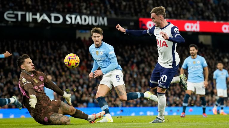 James Maddison chips the ball over Ederson to make it 2-0 to Spurs (AP Photo/Dave Thompson)