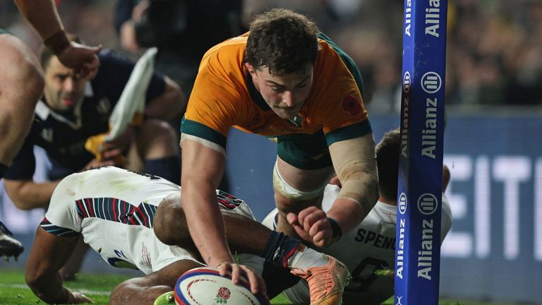 Australia's lock Jeremy Williams scores a try in the corner during the Autumn Nations Series International rugby union test match between England and Australia at the Allianz Stadium, Twickenham in south-west London, on November 9, 2024. (Photo by Adrian Dennis / AFP)