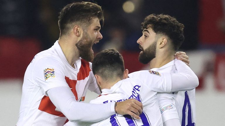 Josko Gvardiol celebrates with team-mates after equalising for Croatia against Portugal