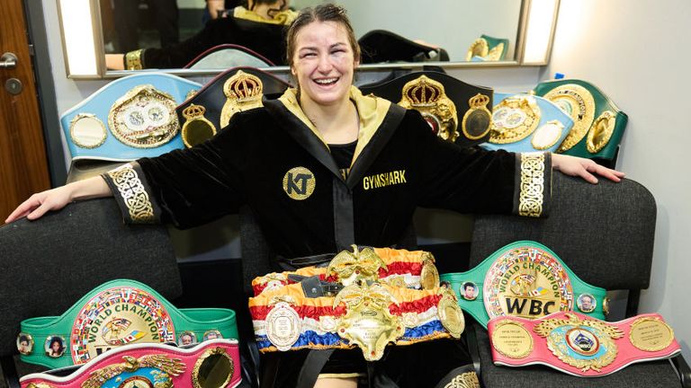 Katie Taylor with all of her title belts