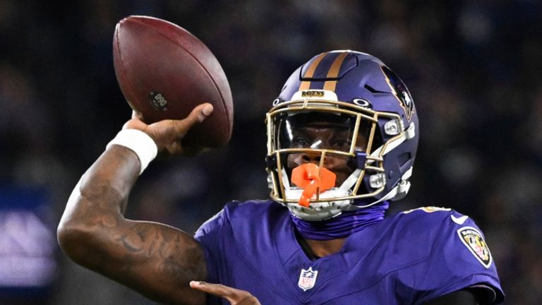 Baltimore Ravens quarterback Lamar Jackson (8) throws a touchdown pass during the second half of an NFL football game against the Cincinnati Bengals, Thursday, Nov. 8, 2024, in Baltimore. (AP Photo/Terrance Williams)