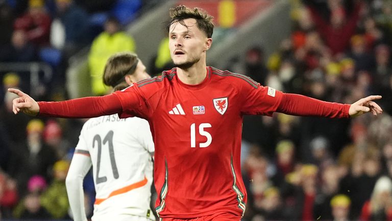 Liam Cullen celebrates scoring for Wales against Iceland