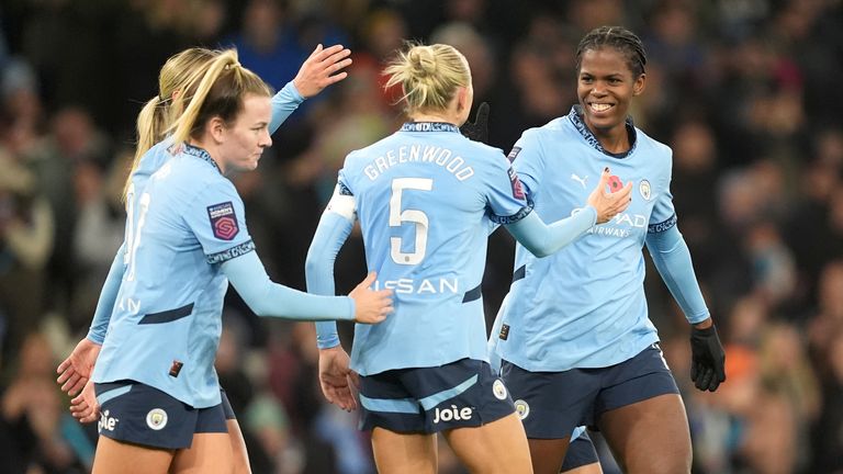 Bunny Shaw celebrates her hat-trick goal against Tottenham