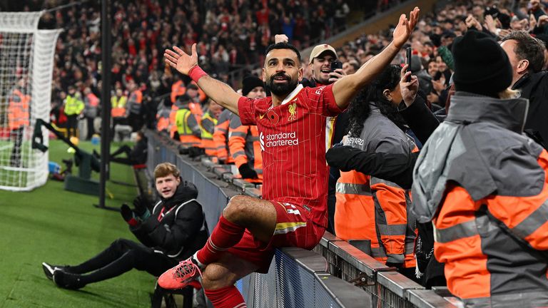 Liverpool's Mohamed Salah celebrating after scoring their second goal