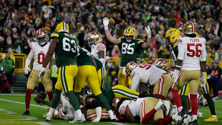 Green Bay Packers running back Josh Jacobs (8) scores a touchdown during the first half of an NFL football game against the San Francisco 49ers on Sunday, Nov. 24, 2024 in Green Bay, Wis.