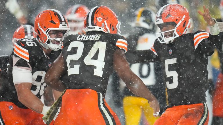 Cleveland Browns running back Nick Chubb (24) celebrates his touchdown with quarterback Jameis Winston (5) and tight end Blake Whiteheart (86) in the second half of an NFL football game against the Pittsburgh Steelers, Thursday, Nov. 21, 2024, in Cleveland. (AP Photo/Sue Ogrocki)