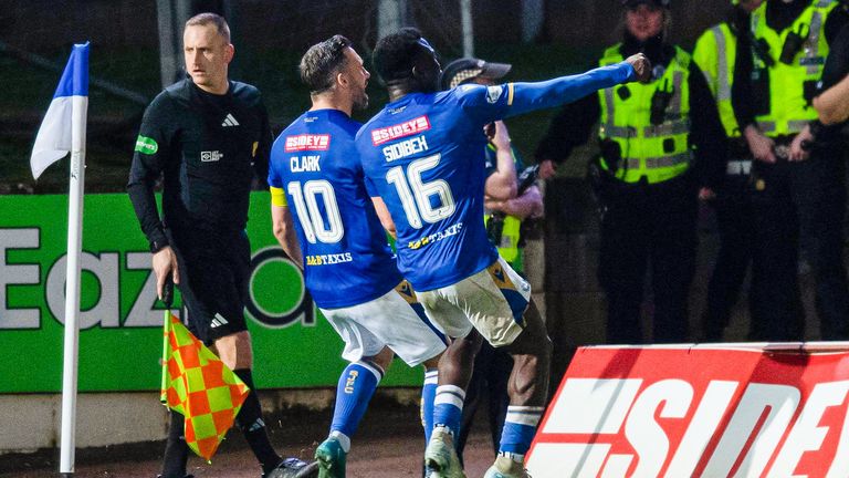 PERTH, SCOTLAND - NOVEMBER 02: St Johnstone's Nicky Clark (L) celebrates scoring a penalty to make it 1-1 with teammate Adamah Sidibeh (R) during a William Hill Premiership match between St Johnstone and Heart of Midlothian at McDiarmid Park, on November 02, 2024, in Perth, Scotland. (Photo by Sammy Turner / SNS Group)