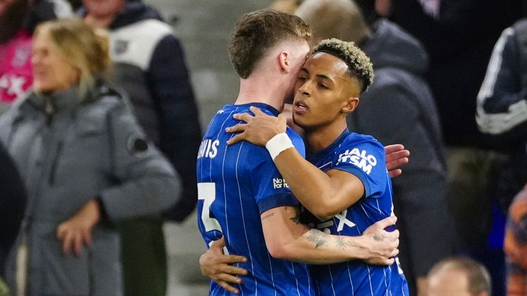 Omari Hutchinson is congratulated after scoring Ipswich's equaliser (AP Photo/Dave Shopland)