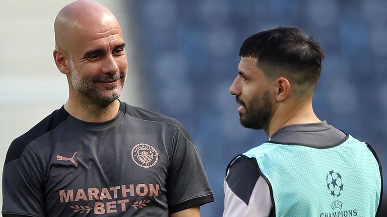 Manchester City manager Pep Guardiola and Sergio Aguero during a training session ahead of the UEFA Champions League final, at the Estadio do Dragao, Portugal. Picture date: Friday May 28, 2021.