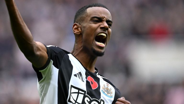 Alexander Isak celebrates after heading Newcastle in front against Arsenal