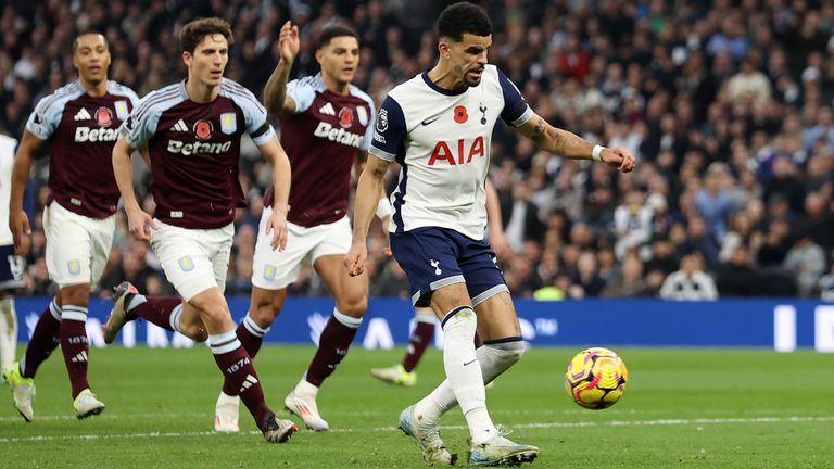 Dominic Solanke scores to give Spurs a 2-1 lead against Aston Villa