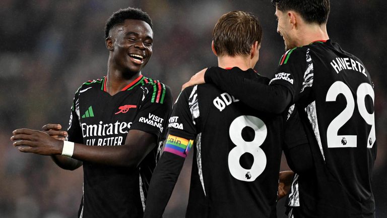 Bukayo Saka celebrates with his team-mates during Arsenal's rampant first -half performance at West Ham