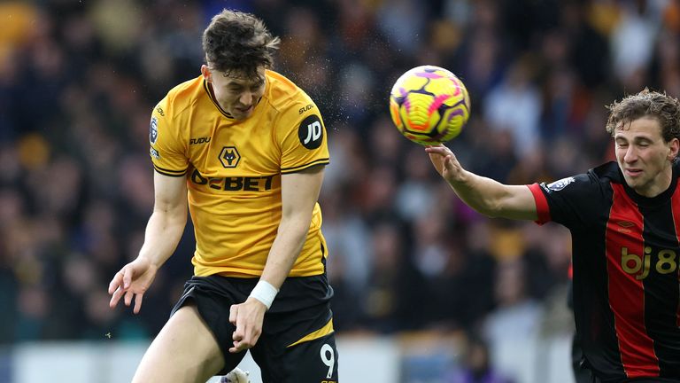 Jorgen Strand Larsen heads in Wolves' equaliser against Bournemouth