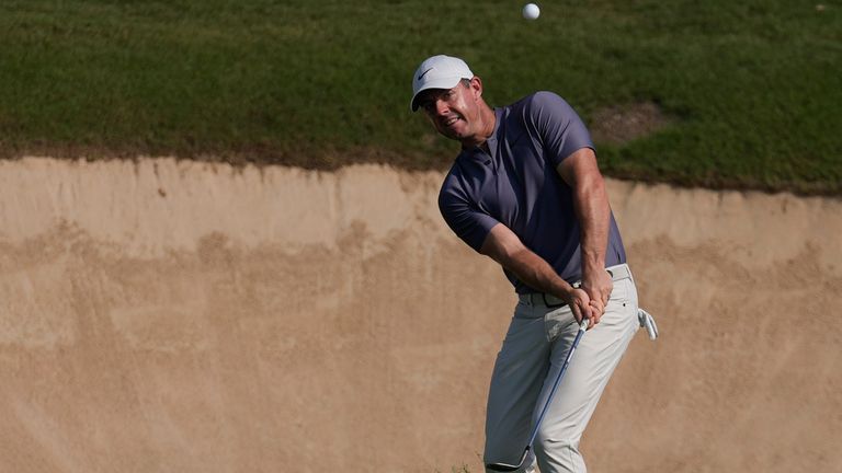 Rory McIlroy of Northern Ireland plays his second shot at the 12th hole during the second round of Abu Dhabi Golf Championship in Abu Dhabi, United Arab Emirates, Friday, Nov. 8, 2024. (AP Photo/Altaf Qadri)