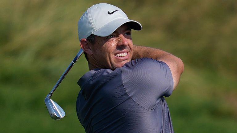 Rory McIlroy of Northern Ireland plays his second shot at the 13th hole during the second round of Abu Dhabi Golf Championship