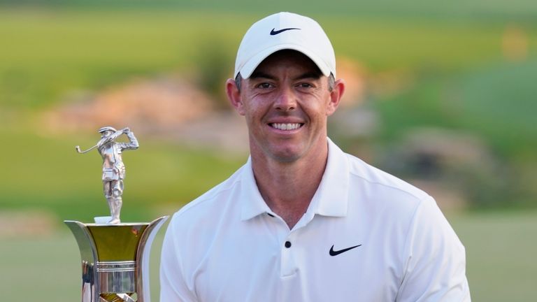 Rory McIlroy of Northern Ireland poses with his Race to Dubai trophy after the final round of the DP World Tour Championship golf tournament, in Dubai, United Arab Emirates, Sunday, Nov. 19, 2023. (AP Photo/Kamran Jebreili)