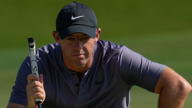 Rory McIlroy of Northern Ireland lines up a putt on the 13th green during the second round of World Tour Golf Championship in Dubai, United Arab Emirates, Friday, Nov. 15, 2024. (AP Photo/Altaf Qadri) 