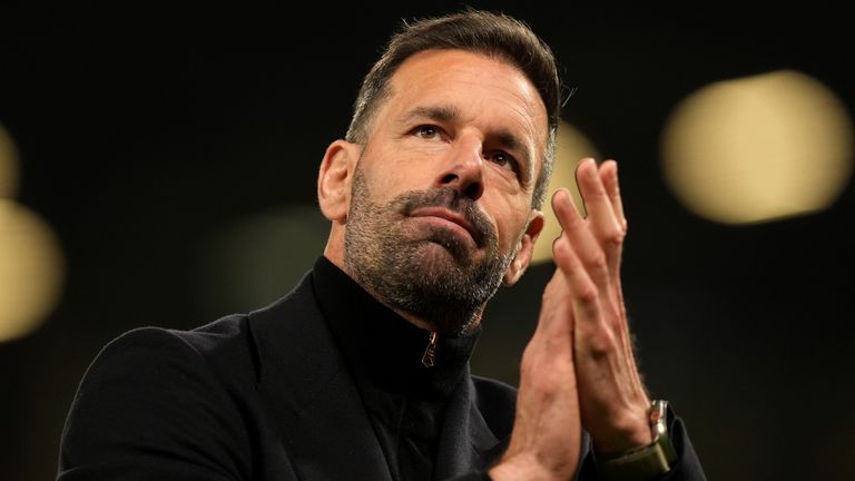 Ruud van Nistelrooy applauds the Old Trafford crowd