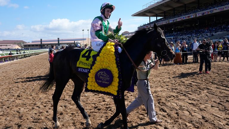 Rossa Ryan celebrates after riding Starlust to victory in the Breeders' Cup Turf Sprint horse race in Del Mar, Calif., Saturday, Nov. 2, 2024. (AP Photo/Gregory Bull)