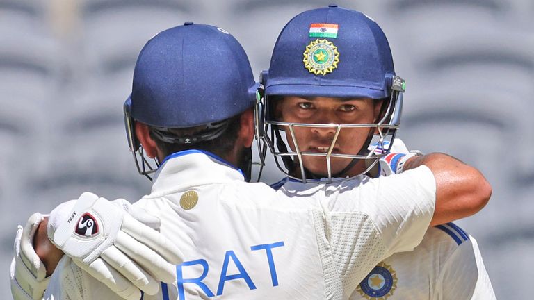 India's Yashasvi Jaiswal is congratulated by Virat Kohli for reaching 150 against Australia in Perth (Associated Press)