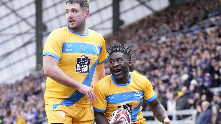 Team Burrow's Waine Pryce celebrates a try during the '745 Game' at Headingley