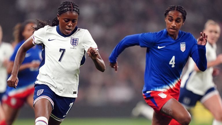 Jessica Naz dribbles away from Naomi Girma