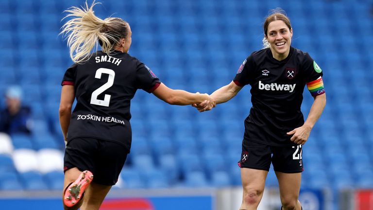 Katrina Gorry celebrates a goal with team-mate Kirsty Smith