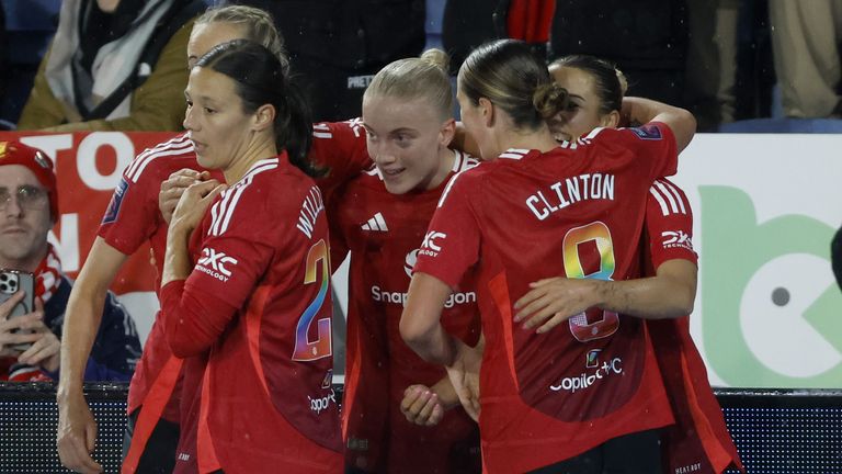 Manchester United players celebrate Celin Bizet Ildhusoy's strike against Leicester