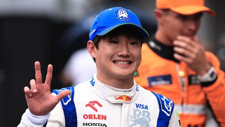 RB driver Yuki Tsunoda of Japan, celebrates his third place after the qualifying session ahead of the Brazilian Formula One Grand Prix at the Interlagos race track, in Sao Paulo, Brazil, Sunday, Nov. 3, 2024. (AP Photo/Ettore Chiereguini)