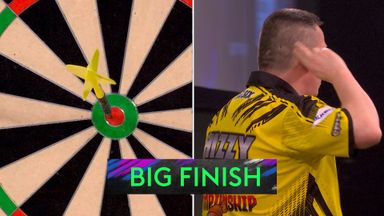 Chisnall laps up the boos after nailing 121 on the bullseye!