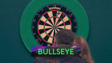 Searle keeps himself alive with a 124 on the bullseye