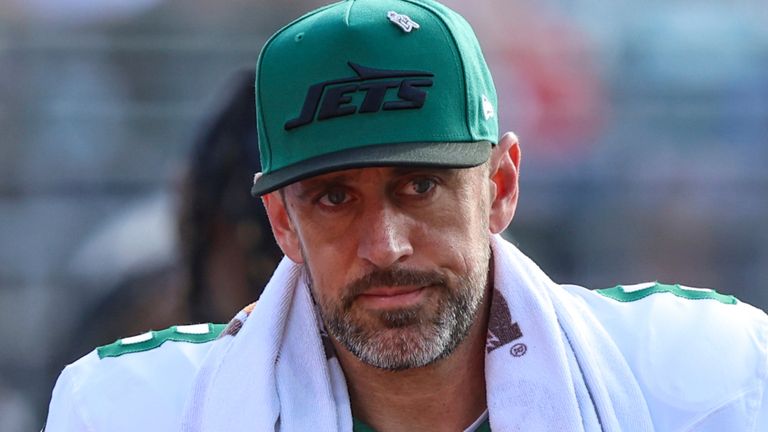 New York Jets quarterback Aaron Rodgers (8) walks the sideline during an NFL football game against the Jacksonville Jaguars, Sunday, Dec. 15, 2024, in Jacksonville, Fla. The Jets defeated the Jaguars 32-25. (AP Photo/Gary McCullough)