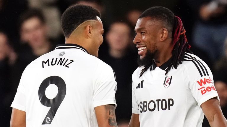 Fulham's Alex Iwobi celebrates scoring the opening goal against Brighton with Rodrigo Muniz 