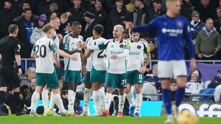 Alexander Isak celebrates scoring Newcastle's third goal