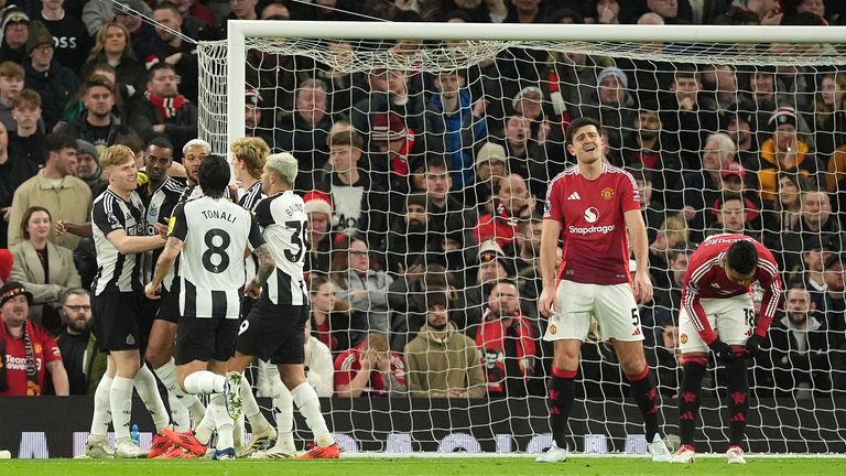 Newcastle United's Alexander Isak (second left) celebrates with team-mates after scoring their side's first goal of the game