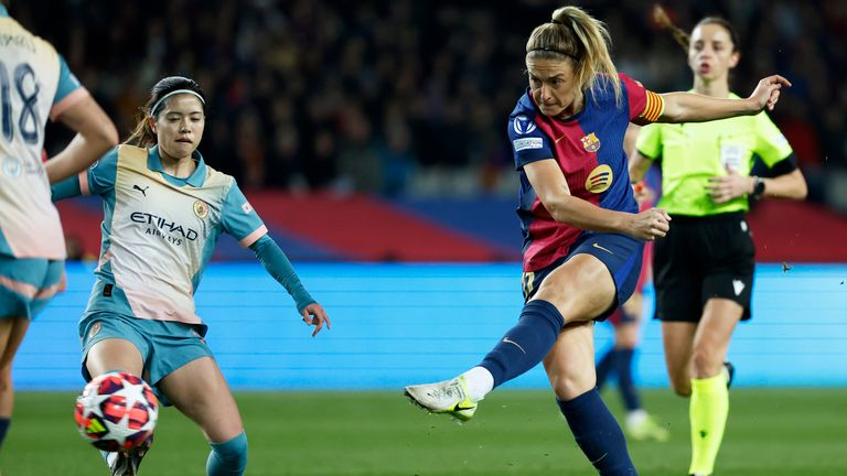 Alexia Putellas of Barcelona scores her team's third goal during the Champions League Women's Group D soccer match between FC Barcelona and Manchester City at the Olympic Stadium in Barcelona, ​​Spain, Wednesday, December 18, 2024. ( AP Photo/Joan Monfort)