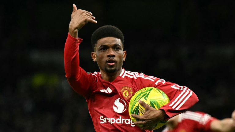 Manchester United's Amad Diallo celebrates scoring the second goal against Tottenham