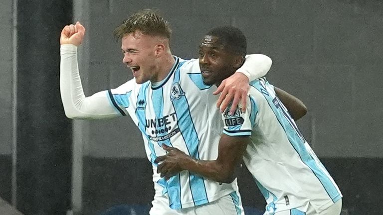 Middlesbrough's Anfernee Dijksteel (right) celebrates scoring against Burnley