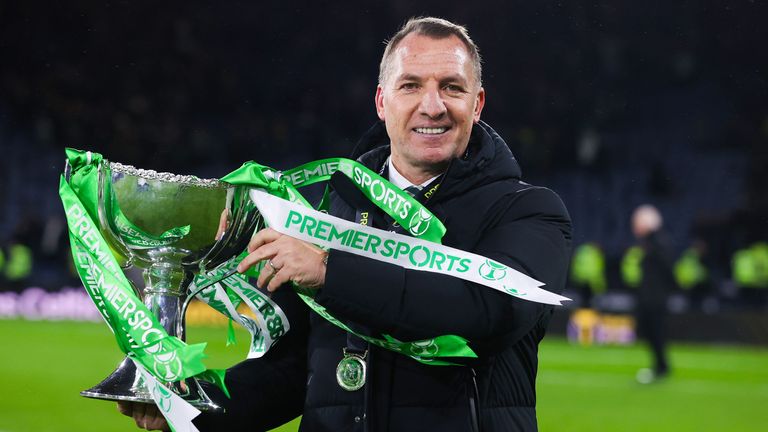 GLASGOW, SCOTLAND - DECEMBER 15: Celtic manager Brendan Rodgers with the Premier Sports Cup trophy during the Premier Sports Cup Final between Celtic and Rangers at Hampden Park, on December 15, 2024, in Glasgow, Scotland. (Photo by Craig Williamson / SNS Group)