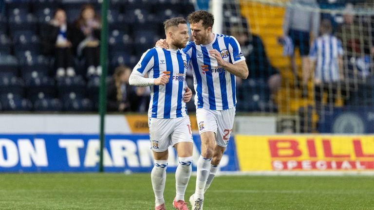 Bruce Anderson (left) celebrates with Marley Watkins