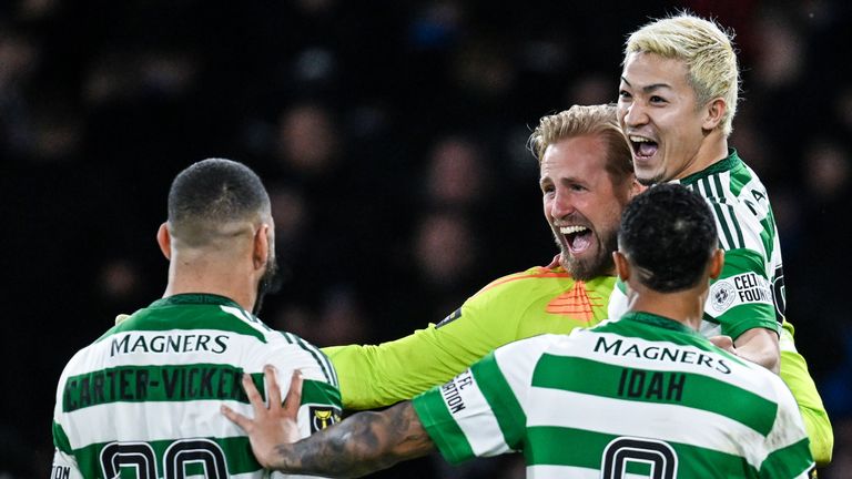 GLASGOW, SCOTLAND - DECEMBER 15: Celtic&#39;s Kasper Schmeichel and Daizen Maeda celebrate with Cameron Carter-Vickers and Adam Idha after winning the shootout during the Premier Sports Cup Final between Celtic and Rangers at Hampden Park, on December 15, 2024, in Glasgow, Scotland. (Photo by Rob Casey / SNS Group)