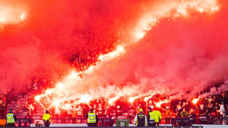 GLASGOW, SCOTLAND - NOVEMBER 02: A general view of pyrotechnics in the Celtic end during a Premier Sports Cup semi-final match between Celtic and Aberdeen at Hampden Park, on November 02, 2024, in Glasgow, Scotland. (Photo by Alan Harvey / SNS Group)