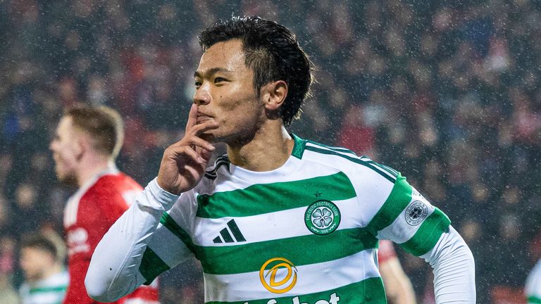 Celtic's Reo Hatate celebrates as he scores to make it 1-0 at Aberdeen