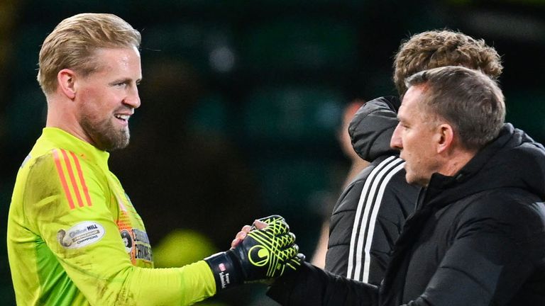 GLASGOW, SCOTLAND - DECEMBER 7: Celtic manager Brendan Rodgers and Kasper Schmeichel at full-time during a William Hill Premiership match between Celtic and Hibernian at Celtic Park on December 7, 2024 in Glasgow, Scotland. (Photo by Rob Casey/SNS Group)