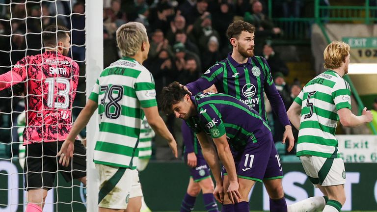 GLASGOW, SCOTLAND - DECEMBER 07: Hibernian's Joe Newell looks dejected after scoring an own goal to make it 2-0 during a William Hill Premiership match between Celtic and Hibernian at Celtic Park, on December 07, 2024, in Glasgow, Scotland. (Photo by Craig Williamson / SNS Group)