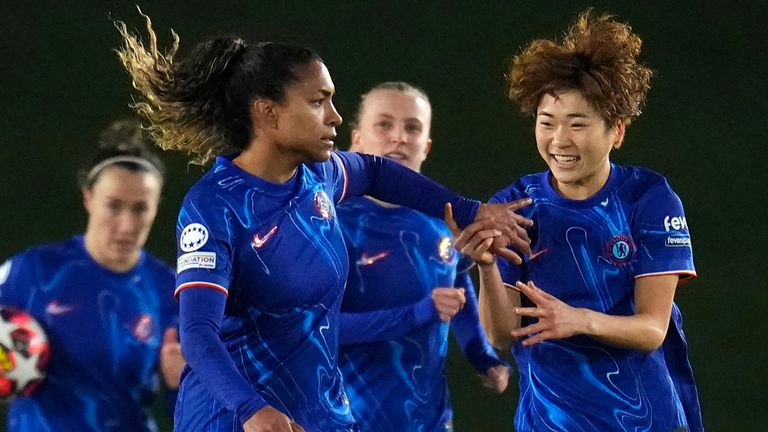 Chelsea's Catarina Macario, center right, celebrates with her teammate after scoring a goal from penalty during the women's Champions League, group B soccer match between Real Madrid and Chelsea at the Alfredo Di Stefano stadium in Madrid, Spain, Tuesday, Dec. 17, 2024. (AP Photo/Manu Fernandez)