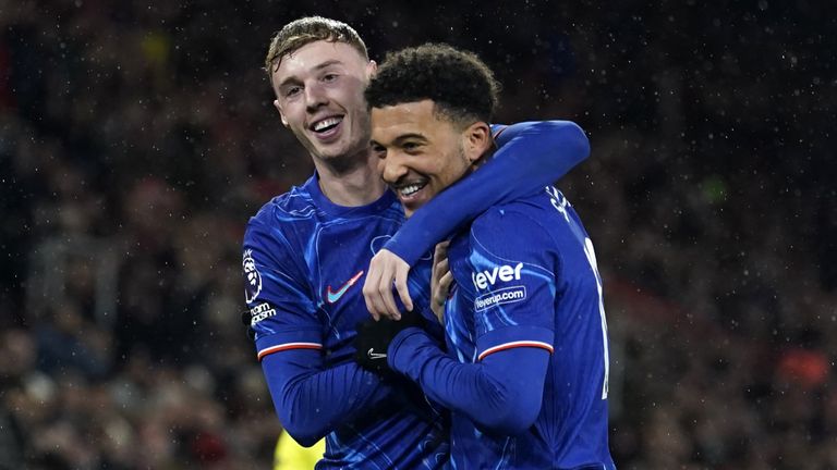 Cole Palmer and Jadon Sancho celebrate Chelsea's fourth